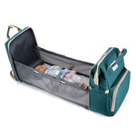 Heavy-duty_baby_bag_with_large_capacity_for_long_trips_and_vacations__Green