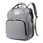 Spacious_baby_travel_backpack_with_strong_zippers_and_durable_fabric__Gray