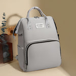 Travel-friendly_baby_bag_with_bottle_holders__Gray