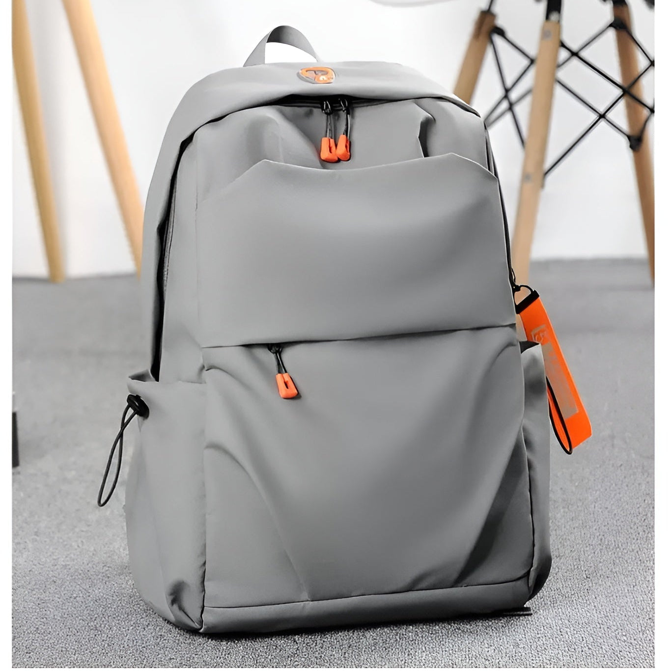 Trendy_backpack_with_orange_accents__Gray