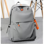 Trendy_backpack_with_orange_accents__Gray