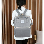 Trendy_black_diaper_bag_for_baby_care_feeding_and_travel__Gray