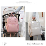 Baby_bag_backpack_with_stroller_strap_and_waterproof_material__Pink