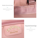 Baby_care_travel_bag_with_waterproof_fabric_and_stylish_design__Pink