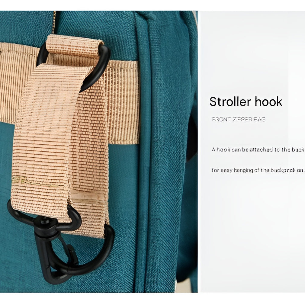 Hands-free_baby_diaper_bag_with_stroller_hooks_and_padded_straps__Green