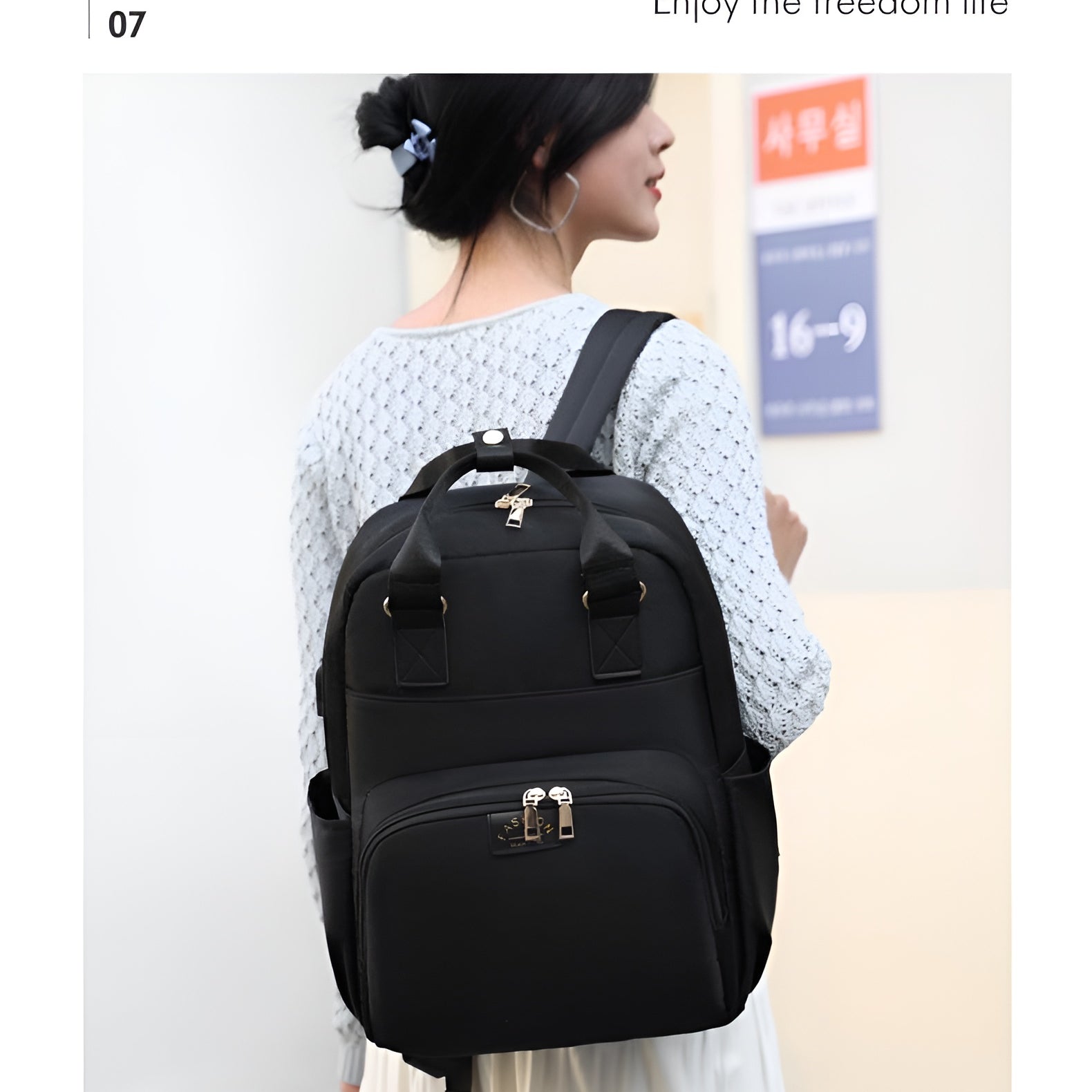 Modern_mommy_backpack_with_insulated_pockets_and_stroller_straps__Black
