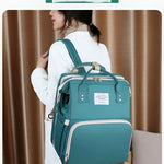 Travel-friendly_baby_diaper_backpack_suitable_for_airplane_travel__Green